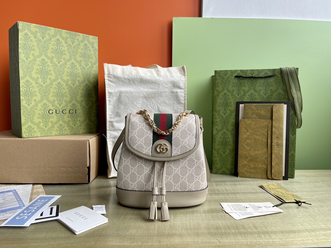 Model: 795221 Size: 20.5/20/12 P1560 The Ophidia collection blends the essence of Gucci's heritage with modern design to present an eye-catching new addition to the Ophidia collection.This backpack is crafted in beige and white GG Supreme canvas with a classic webbing design that is infused with the brand's heritage.Adjustable shoulder straps add a modern touchBeige and white GG Supreme canvasOatmeal color Leather pipingGold tone hardwareRed and green striped webbingBrown cotton linen liningDouble G handlesHigh: 6cmAdjustable leather shoulder straps (length adjustable between 31cm and 35cm)-High-fashion factory