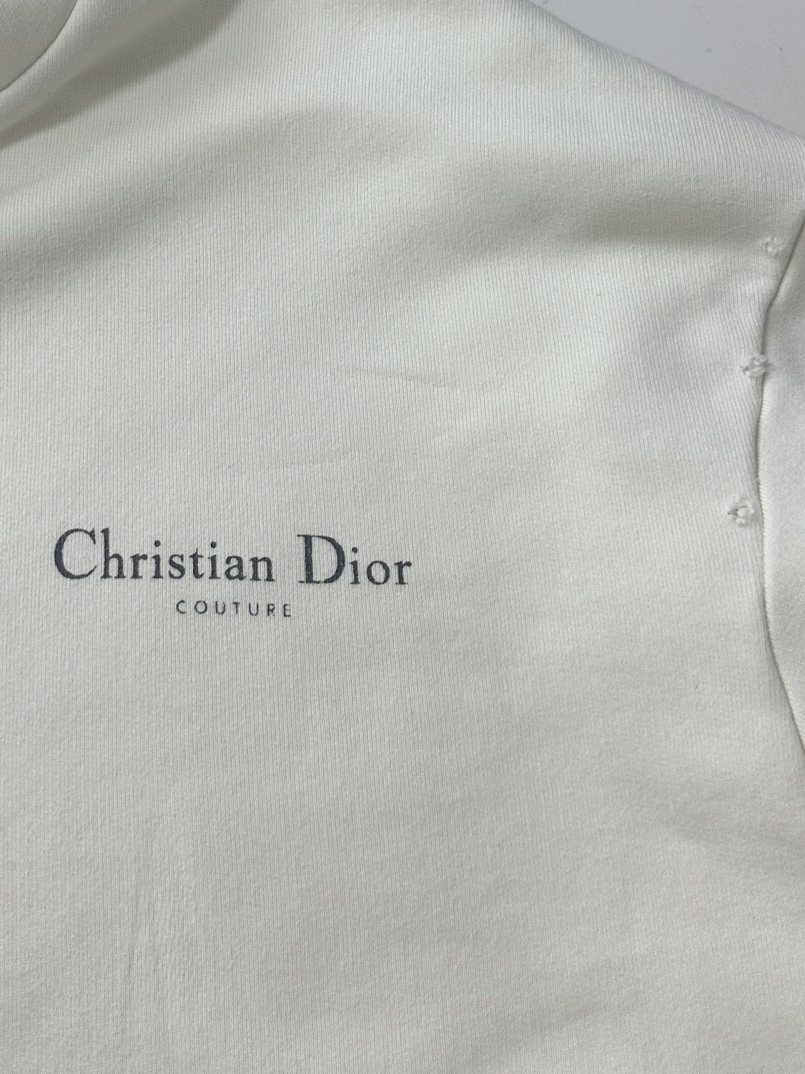 P740 Dior Dior 2024 fall and winter new old mottled letter print hooded sweatshirt men and women this hooded sweatshirt is made of cotton pile fabric carefully crafted with lining design chest and back decorated with Christian Dior Couture print to enhance the tone highlighting the effect of imitation of the old with the same fabric lining casual silhouette with ribbed cuffs and bottom edge texture warm, soft and comfortable can be with the Color: Black White Size: S-XXL-High Fashion Factory