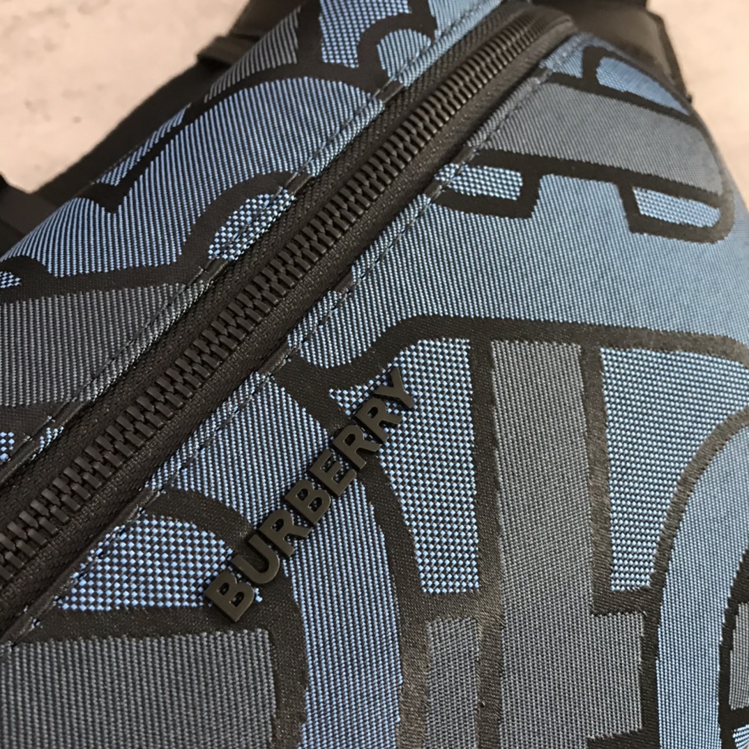 Burberry's blue fanny pack takes a cue from the street style of the nineties and is adorned with a jacquard-worsted logo motif and leather trimmings that can be worn cross-body or around the waist. The main material of this piece is at least 70% from the renewable ingredient S360, and the dimensions are 31 x 7 x 14cm.