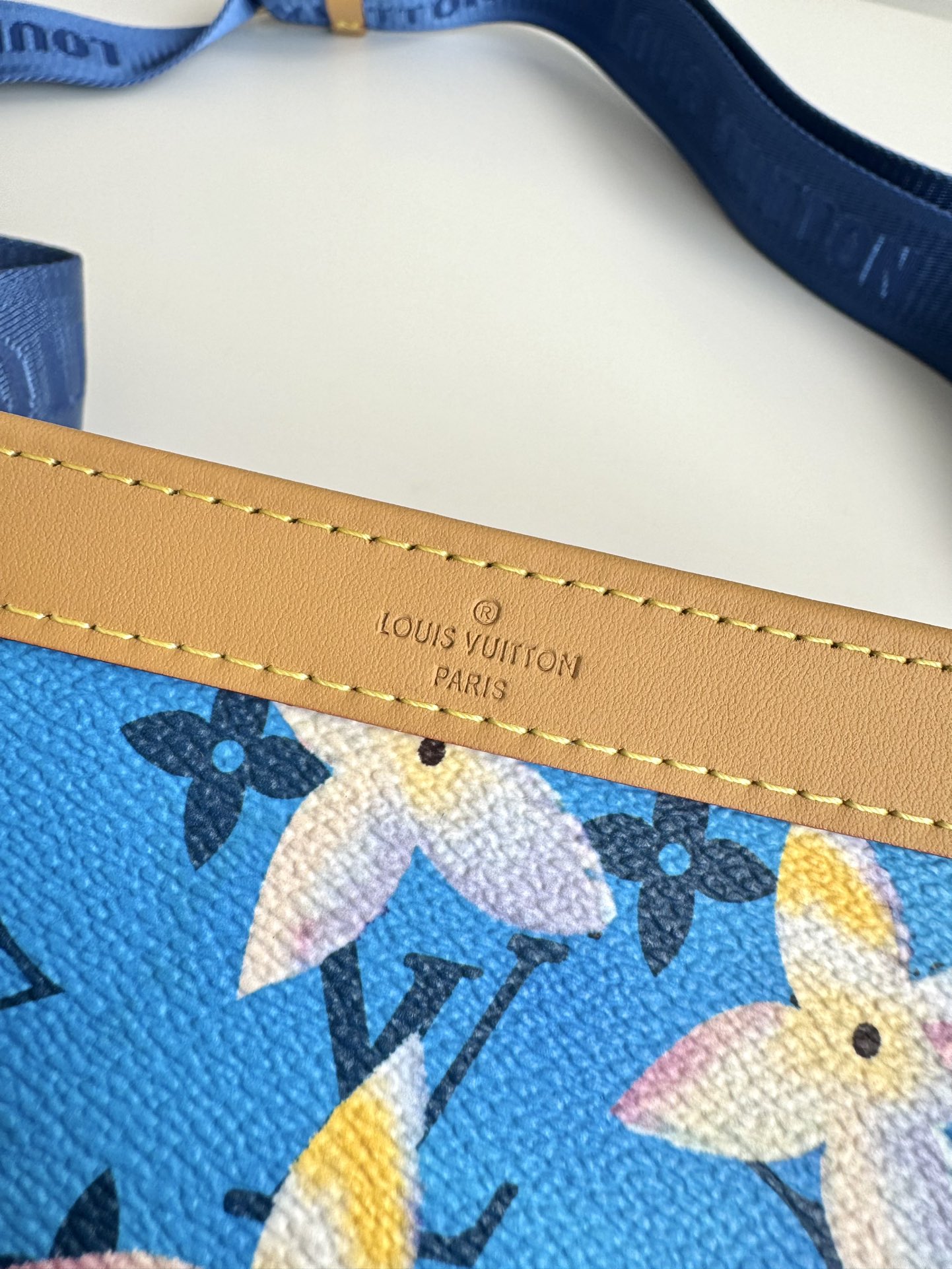 P840 M83466 Surf's Up This Gaston mini bag in Monclerogram Surfin' canvas showcases Pharrell Williams' summery take on colorful prints and is compact enough to hold a smartphone and a short money clip. Crossbody size: 22 x 14.5 x 4.5cm