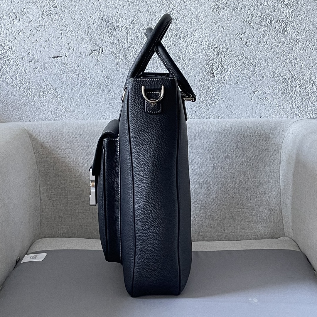 From the Winter 2014 menswear collection, this saddle bag is practical yet stylish, crafted in black grained cowhide leather with the Dior logo to enhance the look and feel of the bag. It features a spacious main compartment for storing everyday essentials, a front saddle flap pocket with a Christian Dior logo aluminum clasp for storing your wallet, keys, earphones or cell phone for easy access, a top leather handle and an adjustable shoulder strap for carrying by hand or across the shoulder. Handheld, shoulder or crossbodyModel 2017Size 32-36-13.5Body: Cow LeatherLining: tech fabric cowhide leatherSpacious main compartmentInterior flat computer compartmentInterior zippered pocketFront flap pocket with CD logo Aluminum buckle leather top handleAdjustable Christian Dior logo nylon jacquard shoulder strapMetal laminated brass Dior logo on frontEmbossed Dior logo on insideInterior dust bag included191701380