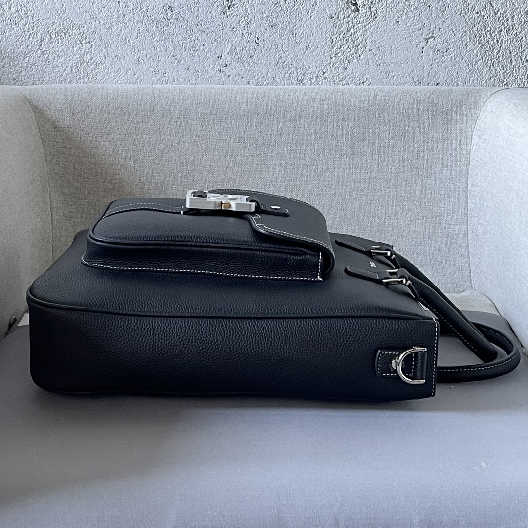 From the Winter 2014 menswear collection, this saddle bag is practical yet stylish, crafted in black grained cowhide leather with the Dior logo to enhance the look and feel of the bag. It features a spacious main compartment for storing everyday essentials, a front saddle flap pocket with a Christian Dior logo aluminum clasp for storing your wallet, keys, earphones or cell phone for easy access, a top leather handle and an adjustable shoulder strap for carrying by hand or across the shoulder. Handheld, shoulder or crossbodyModel 2017Size 32-36-13.5Body: Cow LeatherLining: tech fabric cowhide leatherSpacious main compartmentInterior flat computer compartmentInterior zippered pocketFront flap pocket with CD logo Aluminum buckle leather top handleAdjustable Christian Dior logo nylon jacquard shoulder strapMetal laminated brass Dior logo on frontEmbossed Dior logo on insideInterior dust bag included191701380