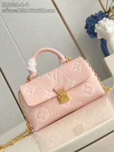 P1360 LV M12144 Milkshake Powder M13796 This pocket-sized version of the Nano Madeleine bag in Monclerogram Empreinte leather features a classic S-lock closure and a detachable chain embellished with the LV Circle logo, making it roomy enough to carry in hand, over the shoulder or crossbody for everyday use. Suitable for carrying by hand, shoulder or crossbody 12.5 x 6 x 21 cm (H x W x L)