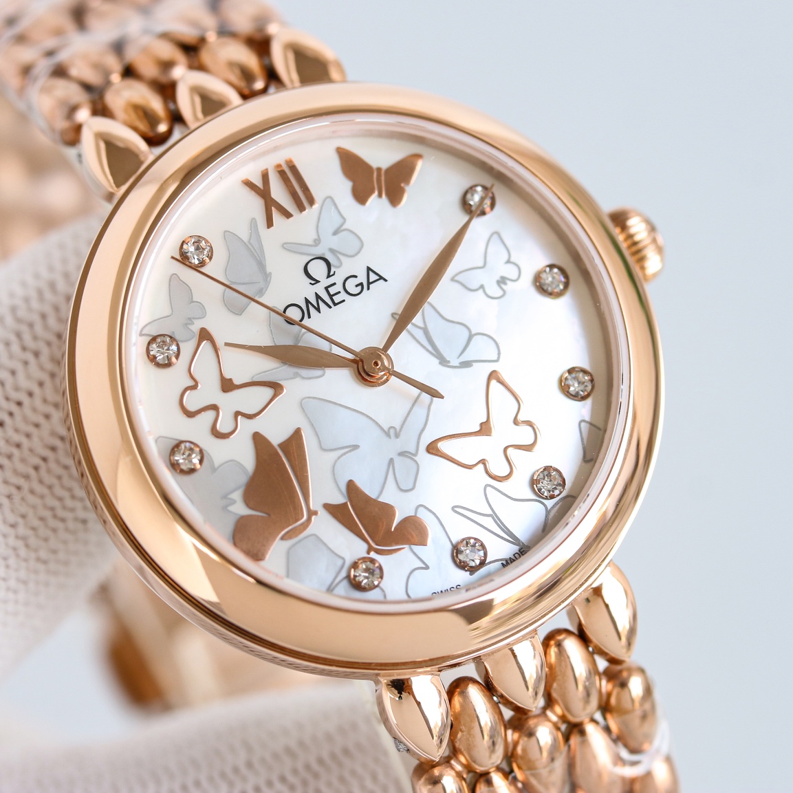 p2700 OMEGA OSCE ELEGANT GOLDEN BUTTERFLY WOMAN'S WATCH with imported 8521/8520 Mechanical 32.7mm natural pearl shell face Sapphire glass 30 metres water resistant Unparalleled... you'll love it !