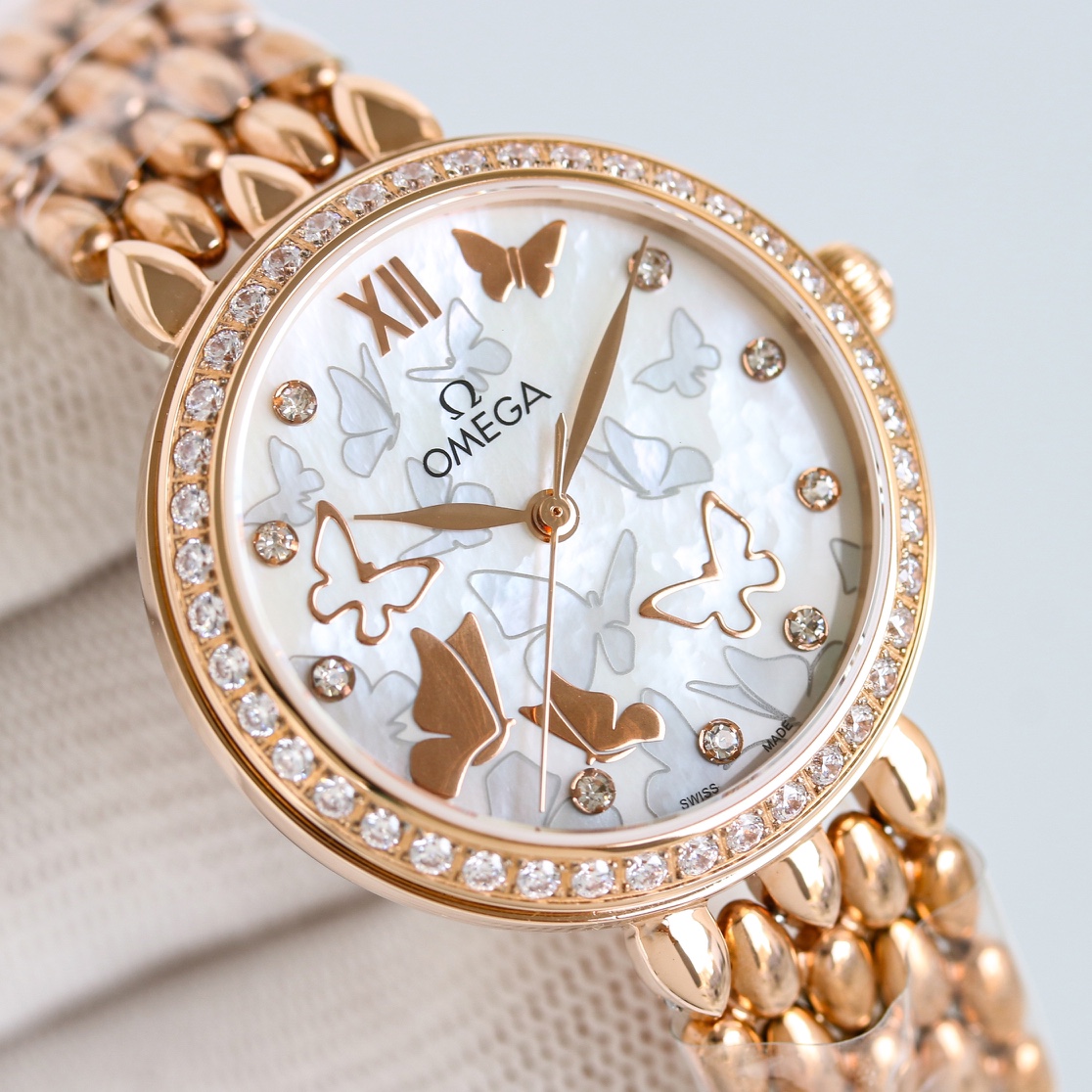 p2700 OMEGA OSCE ELEGANT GOLDEN BUTTERFLY WOMAN'S WATCH with imported 8521/8520 Mechanical 32.7mm natural pearl shell face Sapphire glass 30 metres water resistant Unparalleled... you'll love it !