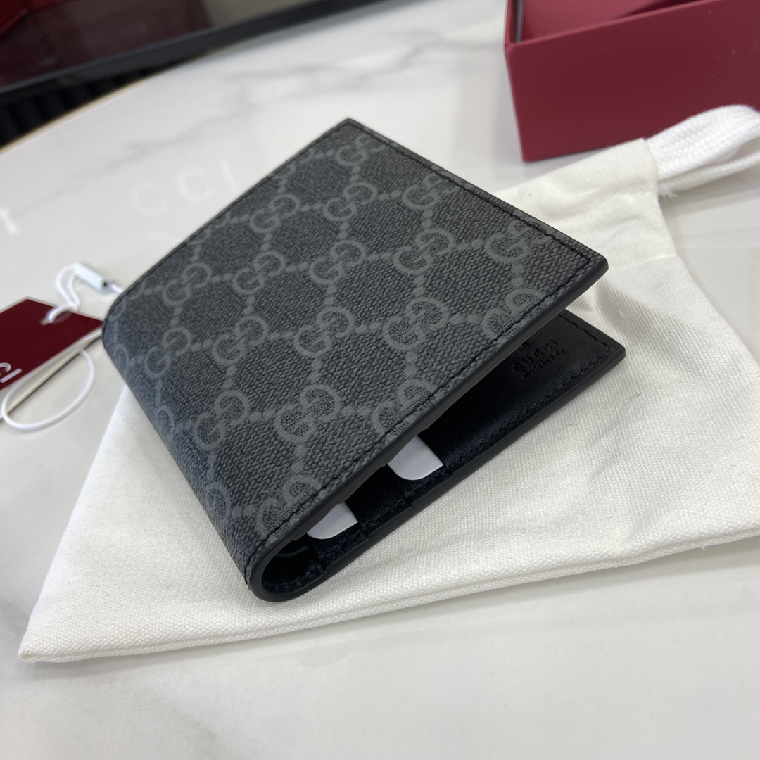 p360 The Gucci GG Emblem collection revitalizes classic motifs with creative design and innovative functionalityCrafted to be treasured for years to come, this bifold wallet is a new interpretation of the accessories collection, crafted in black with the new GG monogrammed fabricThe wallet is a new interpretation of the accessories collection, featuring eight card compartments and a multifunctional banknote compartmentBlack with the new GG monogrammed coated fabricBlue leather liningInterior: eight... card compartments and 1 banknote compartmentWeight: approx. 60 gModel No.: 821206Size when closed: 10 cm (W) x 10 cm (H)Size when open: 20 cm (W) x 10 cm (H)Colors: Gelatine black leather/blackCreation of Italy - high quality bags