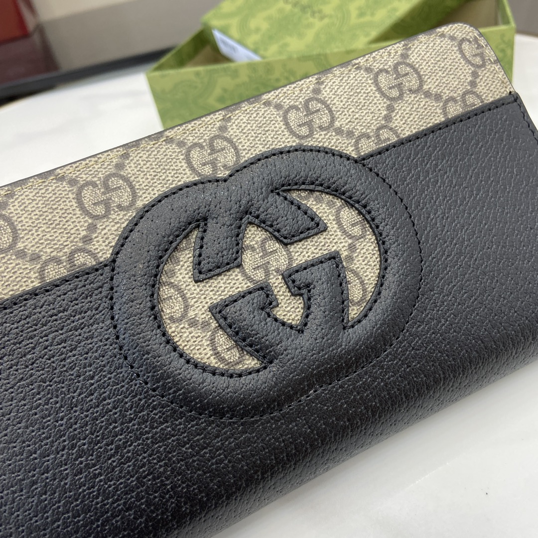 p480 The Gucci Interlocking Double G Wallet has been an integral part of Gucci's collections since its inception in the 1960s. The logo, derived from the initials of the House's founder, Mr. Guccio Gucci, continues to be reinvented in a variety of forms and styles, and is presented on this wallet in leather and GG Supreme canvas with openwork details that create a modern and classic look with accessories in black and brown GG Supreme canvas, black leather piping and cloud fabric lining. This wallet in leather and GG Supreme canvas is crafted with cut-out details to create an accessory that is both modern and classicGG Supreme canvas in black and brownBlack leather pipingCloud fabric liningInterior: 8 card compartments3 banknote compartments1 zipper compartmentModel: 701423Size: 19x10x3cmColor: black leather/pvcItalian Creation