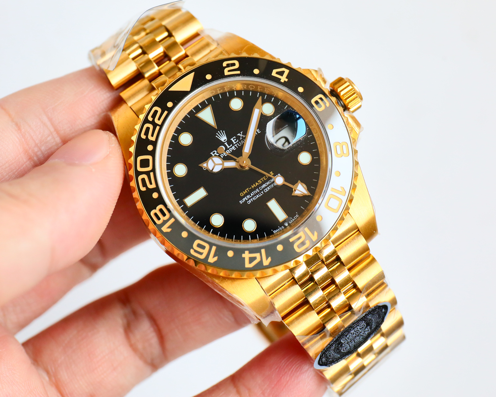 Relógio Rolex GMT GMT inter-ouro O uso de aço 904L genuíno consistente, uma peça de cerâmica em ouro branco, boca da luneta e o mesmo que o novo movimento genuíno de peça única 3285 sincronizado com o ponteiro GMT genuíno através do ajuste positivo e negativo da hora e do calendário acessórios originais universais da caixa de aço 904L pulseira espelho de safira super luminescente luneta rotativa bidirecional de cerâmica fecho dobrável