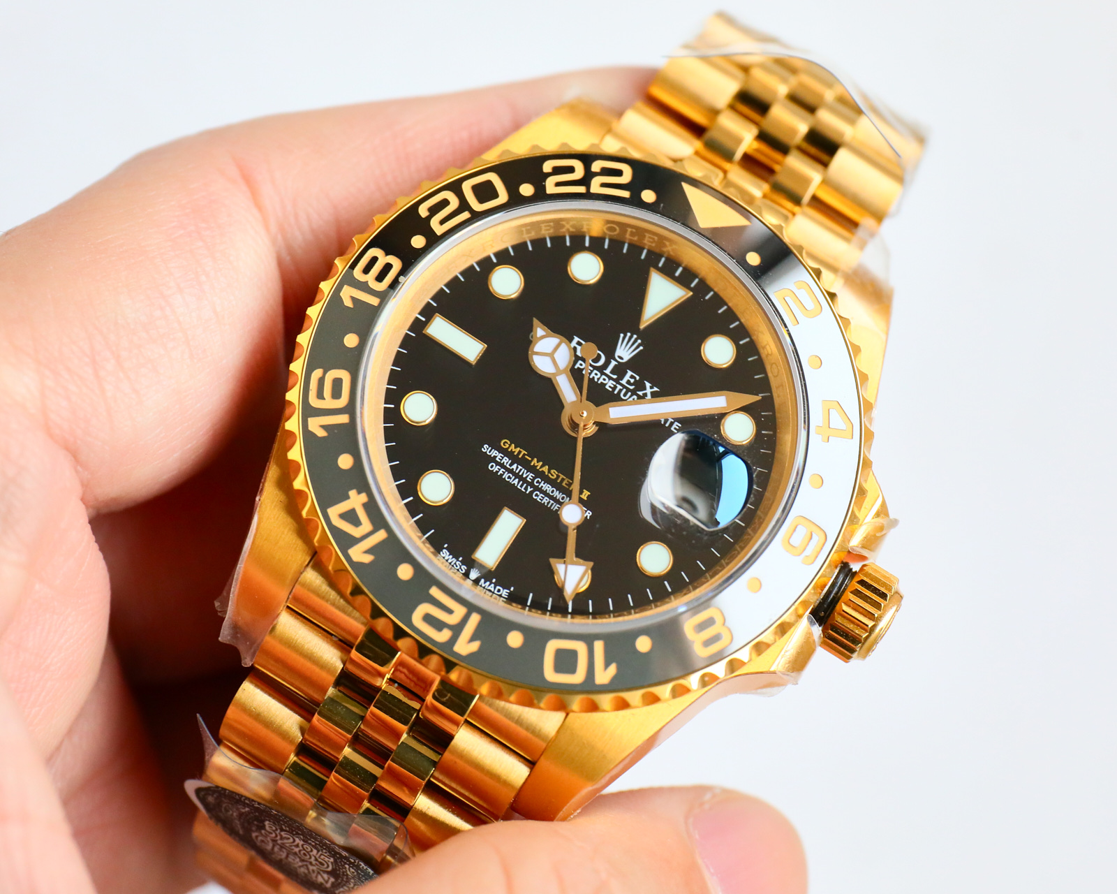 Relógio Rolex GMT GMT inter-ouro O uso de aço 904L genuíno consistente, uma peça de cerâmica em ouro branco, boca da luneta e o mesmo que o novo movimento genuíno de peça única 3285 sincronizado com o ponteiro GMT genuíno através do ajuste positivo e negativo da hora e do calendário acessórios originais universais da caixa de aço 904L pulseira espelho de safira super luminescente luneta rotativa bidirecional de cerâmica fecho dobrável