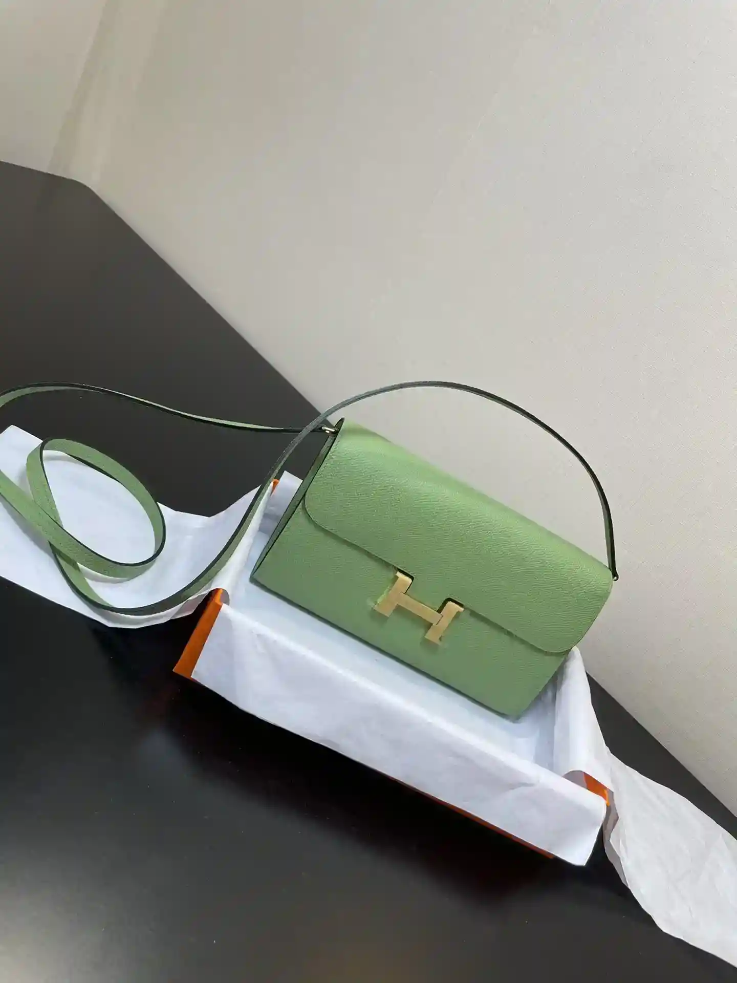 Image [6] - Hermès Constance to go crossbody bag Detail Colour avocado green gold buckle leather epsom (Dimensions : L 20.5 x W 13 x Th 2 cm) Hermès 𝙃𝙚𝙧𝙢𝙚