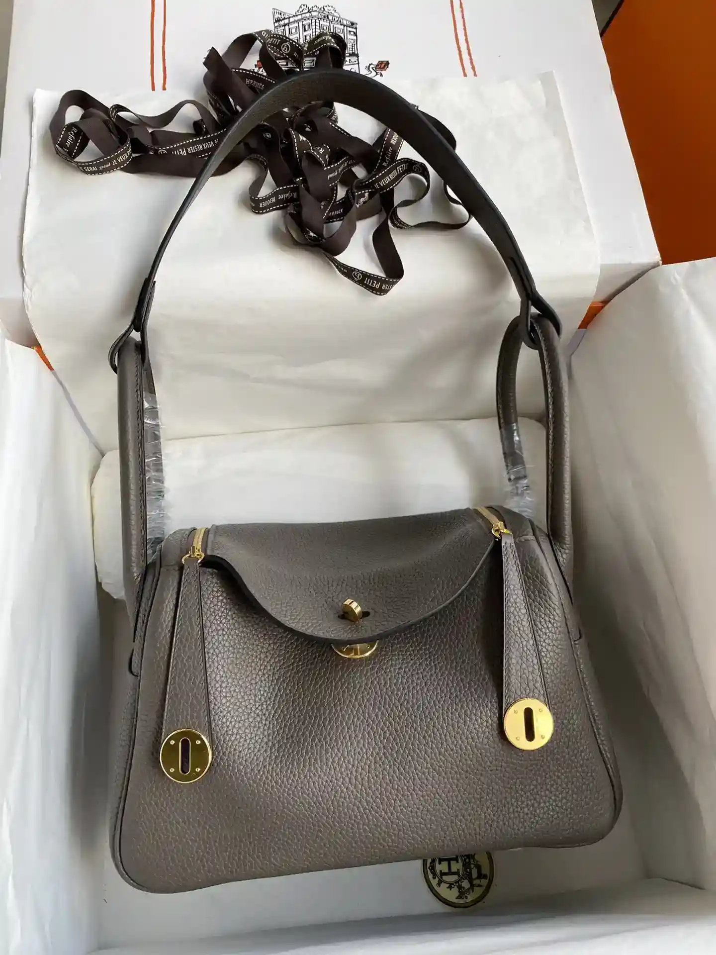 Hermes Lindy 26cm TC Couro Lata Cinzento Fivela Ouro Encerado-Alto Bolsas falsas