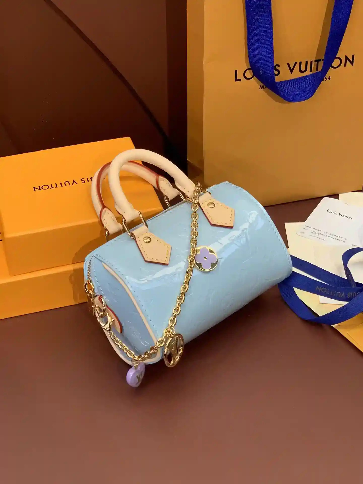 Image [2]-M81879Blue, Nano Speedy HandbagConcentrated on Louis Vuitton's classic Speedy handbag silhouette, the bag is crafted from Monclerogram Vernis embossed lacquered cowhide with cowhide detailing and metal hardwareHandles and detachable and adjustable shoulder strapMore InfoDetailed Features16 x 10 x 7.5 cm-High Replica Bags